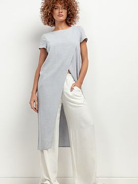 Tunic Tessita  The T405 tunic is the perfect choice for any woman looking for an original and airy piece of clothing for the upcoming summer days. Thanks t