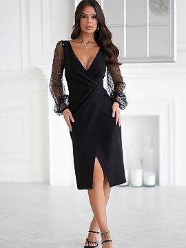 Evening dress Bicotone  Spectacular creation with two sequin sleeves. Delicate neckline in the shape of a heart slightly exposes the bust. The bottom of the dress i