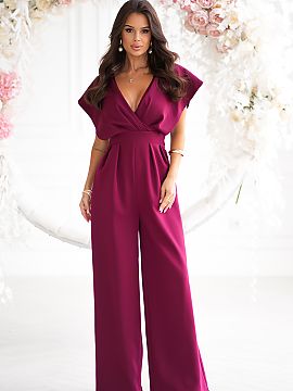 Suit Bicotone  Stylish jumpsuit with a cut-out waist and wide legs. Flared sleeves falling on the shoulders. Perfectly tailored legs lengthen the silhouett