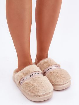 Slippers Step in style  Furry women\'s slippers made of soft, cozy fur, perfectly enveloping the feet, providing warmth and comfort. The model is set on a thicker s