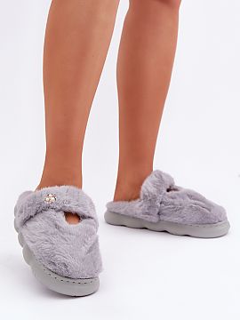 Slippers Step in style  Fur women\'s slippers. The model is decorated with a subtle, small brooch, adding elegance. The stabilizing strap at the back not only incre