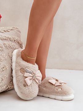 Slippers Step in style  Charming furry slippers that combine comfort and style! Soft fur wraps around the feet, providing warmth and comfort. Additional charm is ad