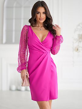 Evening dress Bicotone  Sensational creation with two sequin sleeves. Delicate sweetheart neckline slightly exposes the bust. The bottom of the dress is pleated. Th