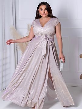 Plus size dress With You  The elegant, shimmering dress in a champagne lilac shade is a perfect choice for special occasions. Made of delicately shimmering material, 