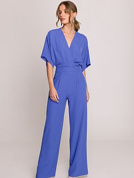 Suit Stylove  Stylish and elegant women\'s jumpsuit that combines comfort with a feminine cut. The top in a wrap style with subtle pleats beautifully fits
