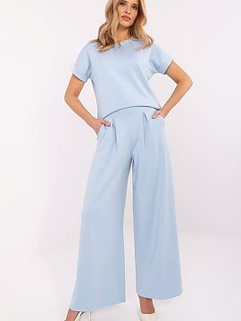Tracksuit trousers Relevance  Stylish palazzo-style sweatpants, combining comfort and elegance in everyday stylizations. Made of a soft blend of viscose, polyester, and e