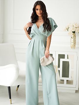 Suit Bicotone  Stylish jumpsuit with a cut waist and wide legs. Flared sleeves falling on the shoulders. Perfectly tailored legs elongate the silhouette, a