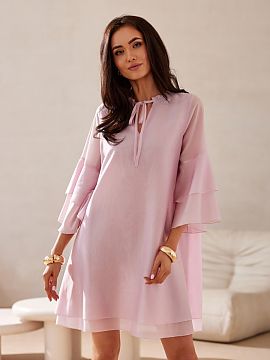 Cocktail dress Roco Fashion  Beatrice dress with a trapeze cut and knee-length, made of lightweight and breathable Lyocell. The model features a V-neck with a low stand-