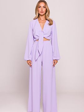 Women trousers Moe  Stylish and comfortable trousers made of lightweight fabric with a distinct crepe texture and a matte finish. The loose fit and wide, long l