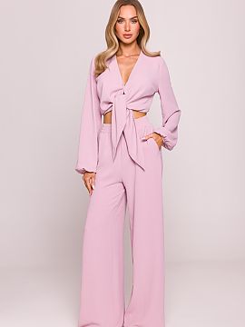 Women trousers Moe  Stylish and comfortable trousers made of a light fabric with a distinct crepe texture and a matte finish. The loose fit model with wide, lon