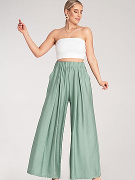 Women's pants Figl  Loose, wide-leg trousers with pleats made of light, breathable material. Model with a high waist and an elastic waistband.