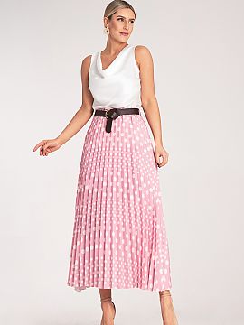 Skirt Figl  Pleated midi skirt, decorated with a pattern of white polka dots. The model has a high waist, subtle pleats, and a stylish belt with a buckl