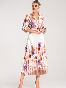 Daydress Figl  Satin maxi dress with floral print, wrap neckline, and long sleeves with elastic cuffs. Pleated bottom and elastic waistband.