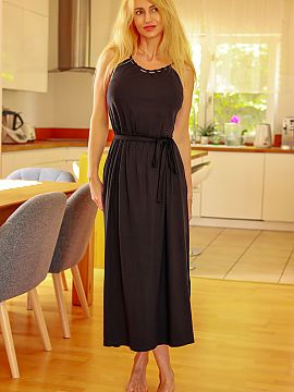 Daydress Mirale  Long viscose dress with a decorative neckline. The dress has a slit on one side, and the waist is emphasized by an elastic band sewn in. Tha