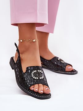 Sandals Step in style  Women\'s sandals made of natural suede leather are an elegant option for summer days. Set on a flat heel, they offer comfort and convenience