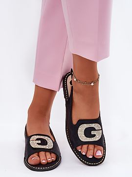 Sandals Step in style  Women\'s sandals made of eco leather are a stylish proposal for hot days. Set on a flat heel, they guarantee comfort and stability throughou