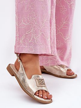 Sandals Step in style  Women\'s sandals made of eco leather are an elegant proposal for summer days. Set on a flat heel, they provide comfort and stability through