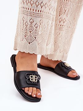 Flip-flops Step in style  Women\'s flat-heeled sandals are a comfortable and stylish option for warm days. There is a subtle decorative detail on the strap that gives