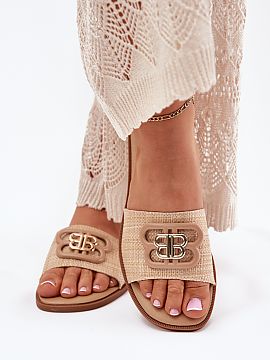 Flip-flops Step in style  Women\'s flat-heeled sandals are a comfortable and stylish option for warm days. The strap features a subtle decorative detail that gives th