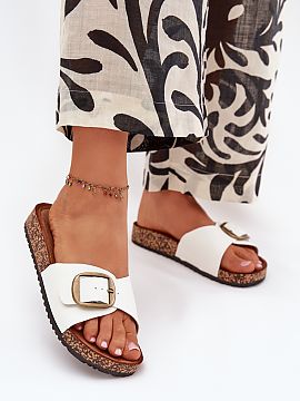 Flip-flops Step in style  Women\'s faux leather sandals, set on a cork platform, are a combination of style and comfort. The profiled faux suede insole provides comfo