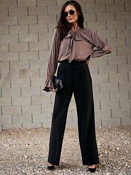 Women's pants Roco Fashion  Model Viana is a combination of elegance and comfort. The characteristic darts, high waist, and wide legs subtly elongate the silhouette and
