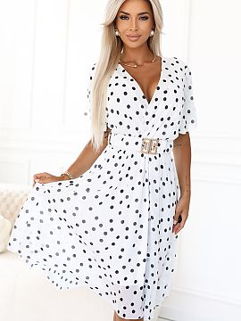 Daydress Numoco  The white dress with black polka dots in the style of Marilyn Monroe is the quintessence of femininity and timeless elegance. Made of lightw