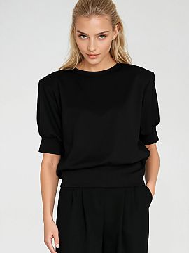 Blouse Nife  Stylish women\'s oversized blouse is the perfect combination of comfort and style. It has a round neckline and short sleeves finished with s