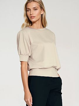 Blouse Nife  Fashionable women\'s oversize blouse is the perfect combination of freedom and style. It has a round neckline and short sleeves finished wit