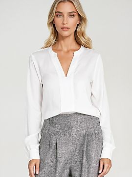 Blouse Nife  Classic women\'s blouse with a regular cut made of lightweight and breathable viscose. The model has a V-shaped neckline with a wide pleat, 