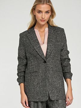 Jacket Nife  Stylish women\'s blazer with a regular, loose cut, made of material with a mottled texture and uneven color, which gives it a modern charact