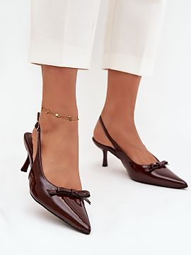 Heel pumps Step in style  Elegant women\'s pumps made of eco-leather are a classic in a feminine edition. Slim stiletto heels and pointed toes beautifully slim the le