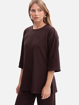 Blouse BeWear  Women\'s blouse made of high-quality ribbed fabric with a weight of 250 g, which is elastic, comfortable, and pleasant to wear. A model put 