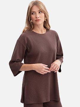 Blouse BeWear  Women\'s blouse made of high-quality ribbed fabric weighing 250 g, which is elastic, comfortable, and pleasant to wear. A model put on over 