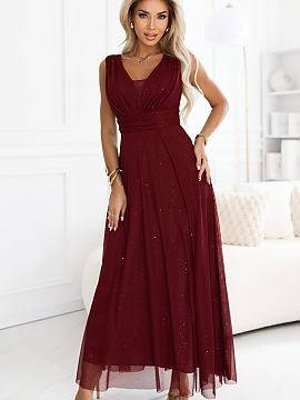 Long dress Numoco  An elegant long evening dress Numoco Basic delights with its classic cut and subtle sheen. The soft, elastic material beautifully lays on th