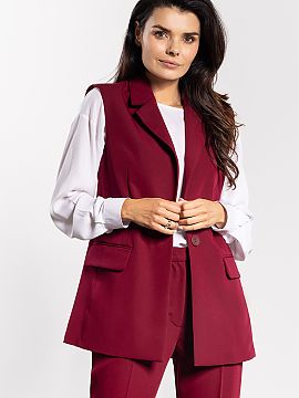 Vest awama  Stylish vest with a simple, classic cut is a timeless wardrobe piece. The single-breasted button closure and lapels at the neckline emphasiz