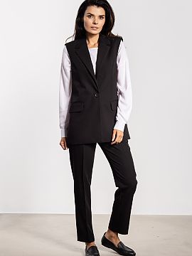 Vest awama  Stylish vest with a simple, classic cut is a timeless element of wardrobe. Single-breasted button closure and lapels at the neckline emphasi