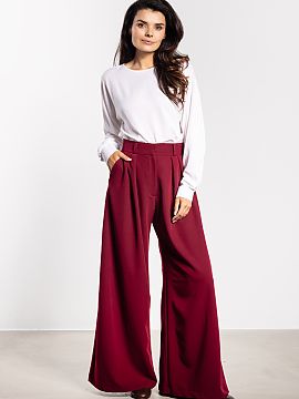 Women's pants awama  Stylish trousers with wide legs combine comfort with elegance. The high waist accentuates the waist and visually elongates the silhouette, w