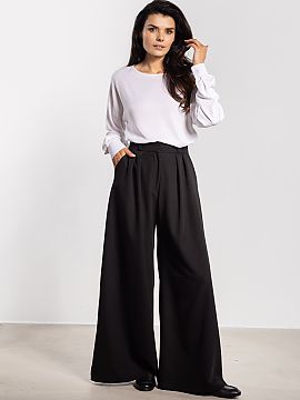 Women's pants awama  Stylish wide-leg pants combine comfort with elegance. The high waist emphasizes the waist and visually elongates the silhouette, while the f