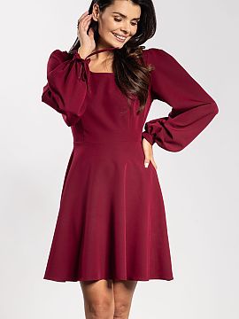 day dress awama  The mini dress with a flared cut combines elegance with lightness. The semi-circular neckline subtly accentuates the neck and shoulders, whi