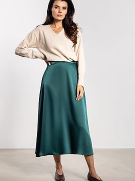 Skirt awama  Satin midi skirt is a classic and elegant wardrobe piece. The delicate sheen of the fabric adds a unique character to the styling, working w