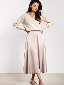 Skirt awama  Satin midi skirt is a classic and elegant piece of clothing. The delicate shine of the fabric adds a unique character to the styling, workin