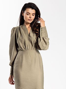 Formal dress awama  A mini dress with an elegant cut is a great choice for special occasions. The fitted top with a deep V-neck subtly accentuates the bust, whi