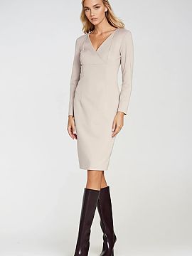 Daydress Nife  An elegant dress with a tailored fit, made of soft and stretchy fabric that perfectly fits the silhouette. The model features a wrap necklin