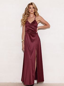 Long gown Roco Fashion  Flowy maxi dress with thin straps, wrap top, subtly flared bottom with a striking slit on the leg. The model is unlined, with decorative lac