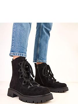 Botki Solea  Stylish ankle boots made of high-quality faux suede leather, combining a fashionable look with comfort. The model features lacing at the fro