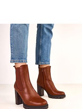 Heeled boots Solea  Elegant ankle boots made of high-quality ecological leather, which perfectly combine style and comfort. The model is equipped with an elasti