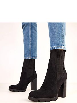 Heeled boots Solea  Stylish ankle slip-on boots made of high-quality ecological suede leather, combining elegance with everyday comfort. The model has a flexibl