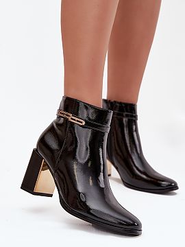Heel boots Step in style  Women\'s ankle boots made of patent eco leather. The model is set on a stable pillar-type heel, decorated with a mirrored element, looks exc