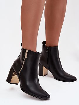 Heel boots Step in style  Women\'s ankle boots made of eco leather are an elegant proposition that combines classic with a modern accent. The model set on a stable co