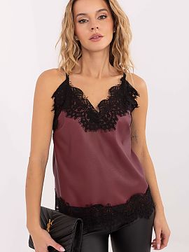 Top Rue Paris  Stylish women\'s faux leather top is a trendy proposal perfect for everyday and casual stylizations. Made of a combination of polyester and 